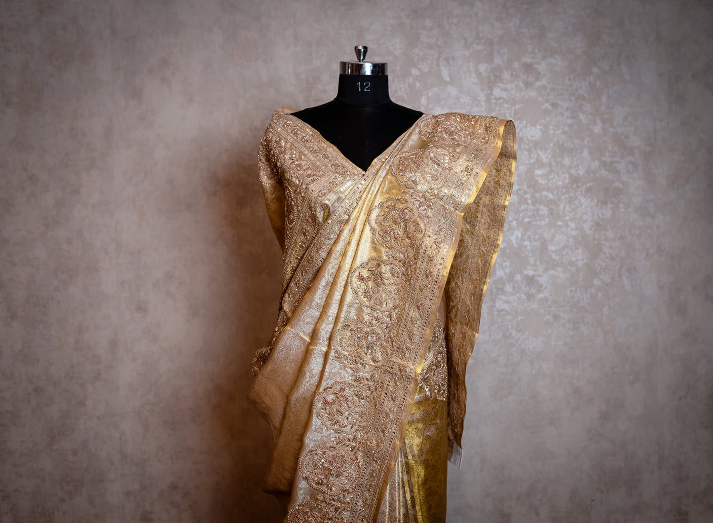 A GOLD EMBROIDERED BROCADE SAREE 8292