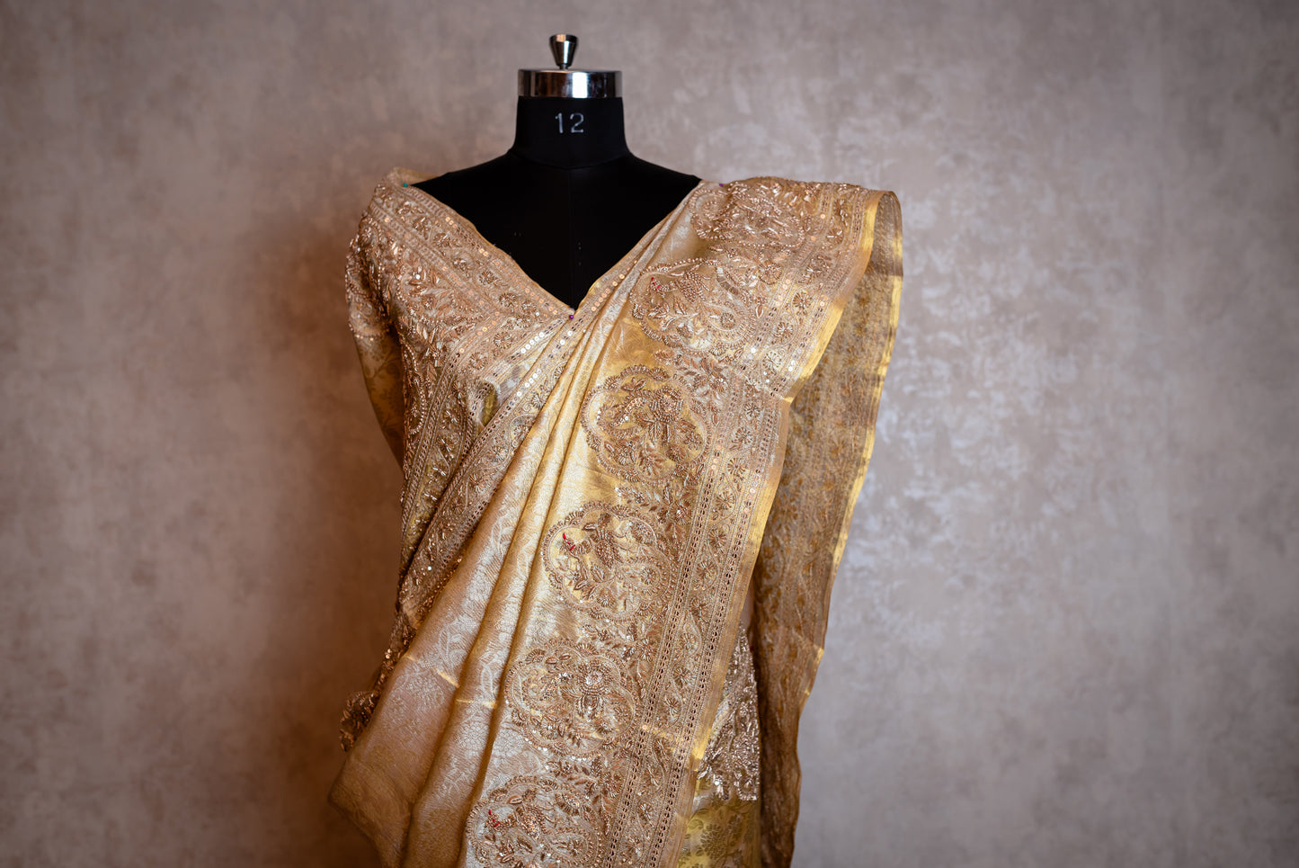 A GOLD EMBROIDERED BROCADE SAREE 8292